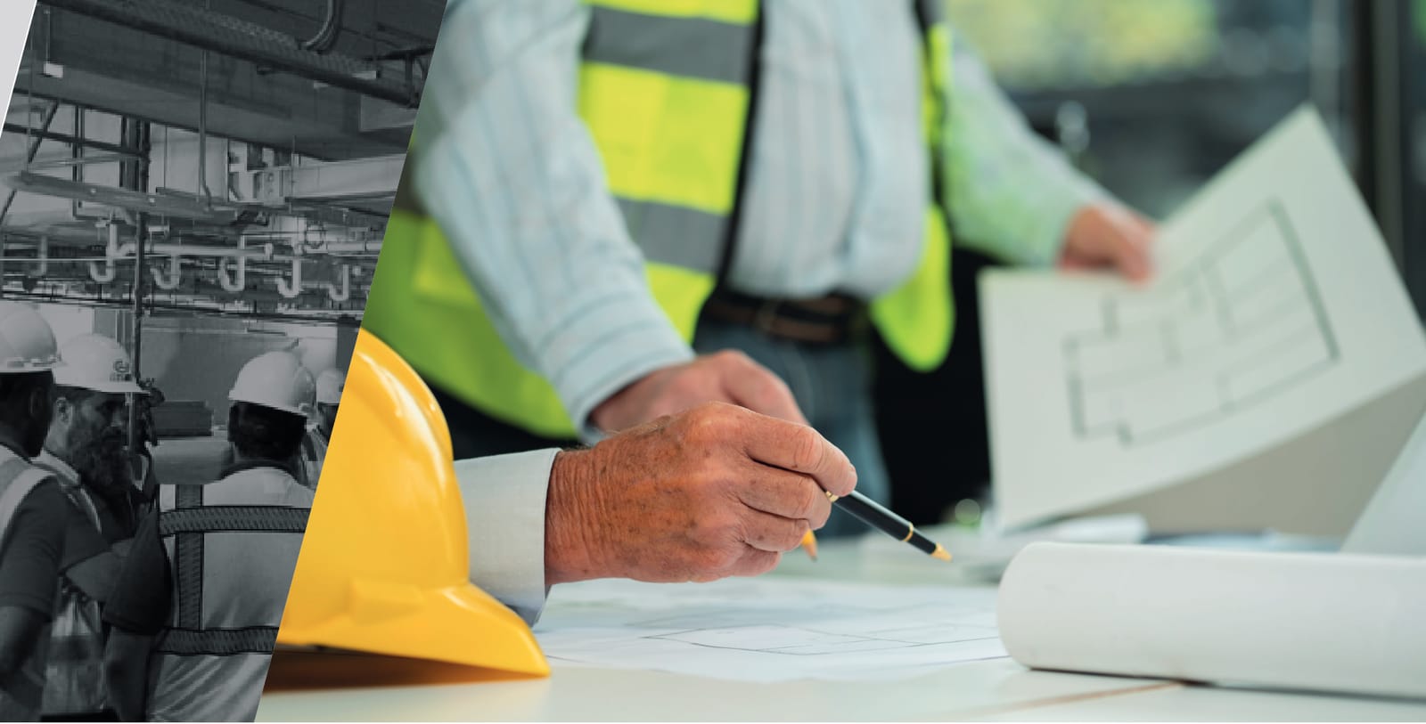 Engineers reviewing safety scheme drawings